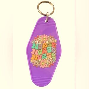 Cute NURSE  motel keychain! Lavender Color Plastic shape rounded diamond